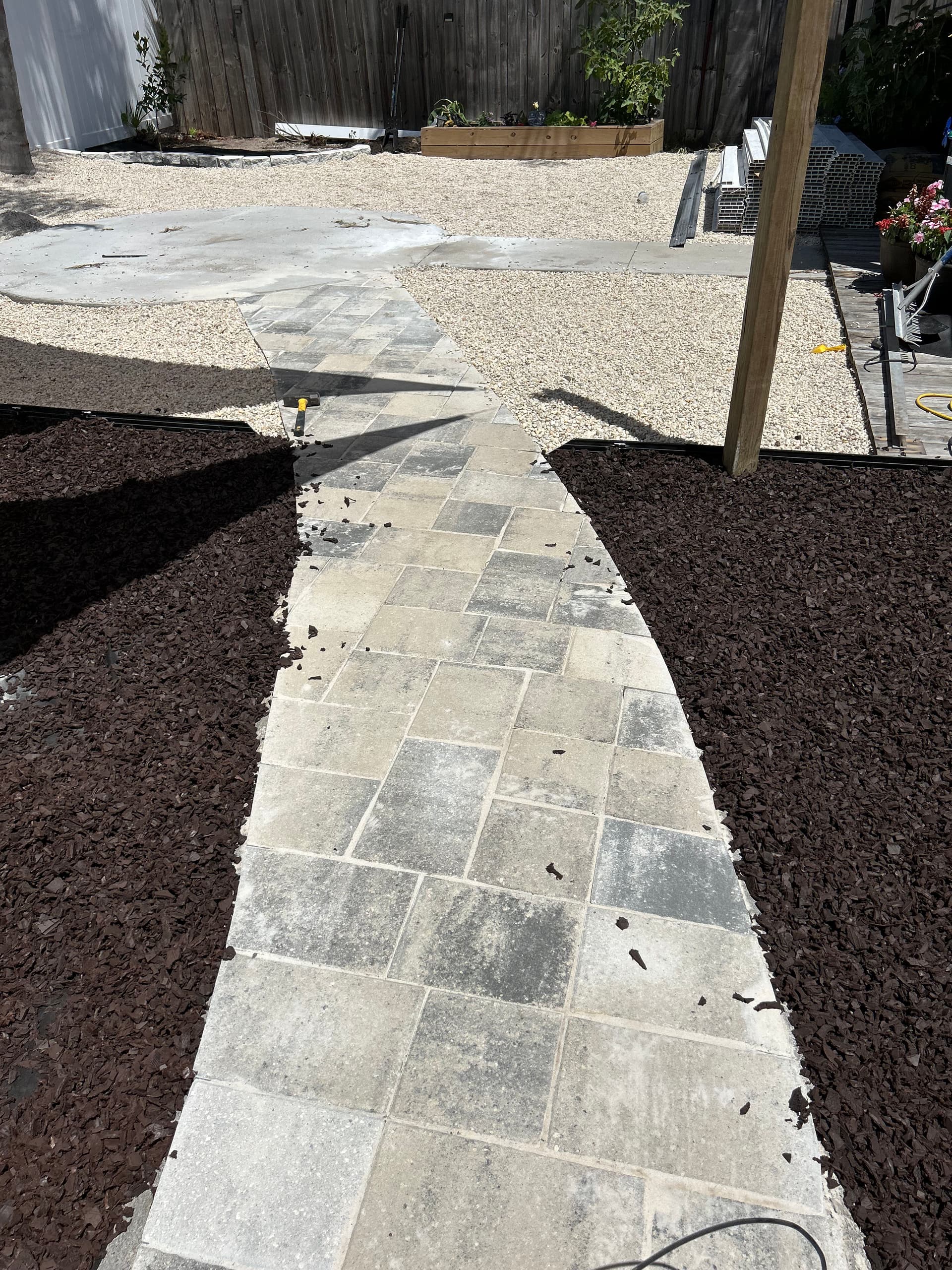 Gallery photos for Backyard Transformation with Stylish Pathways and Kid-Friendly Features: Image #8