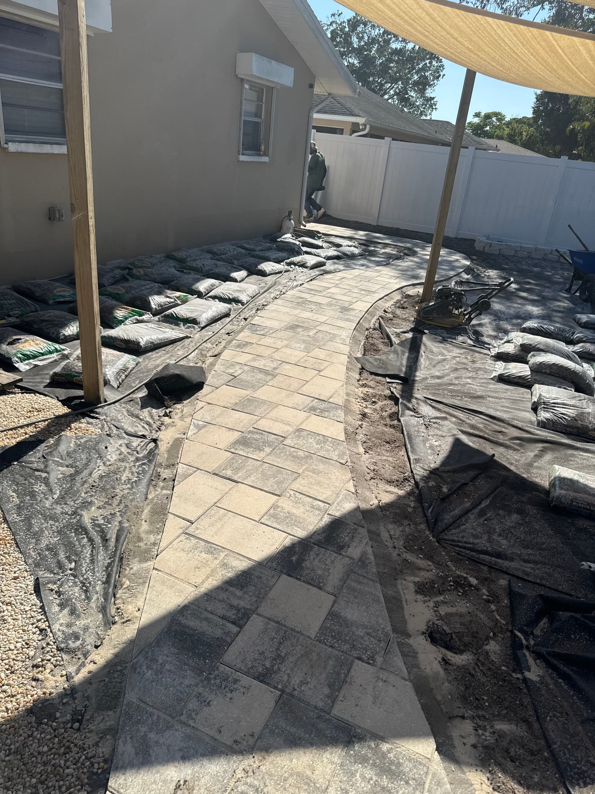 Gallery photos for Backyard Transformation with Stylish Pathways and Kid-Friendly Features: Image #5