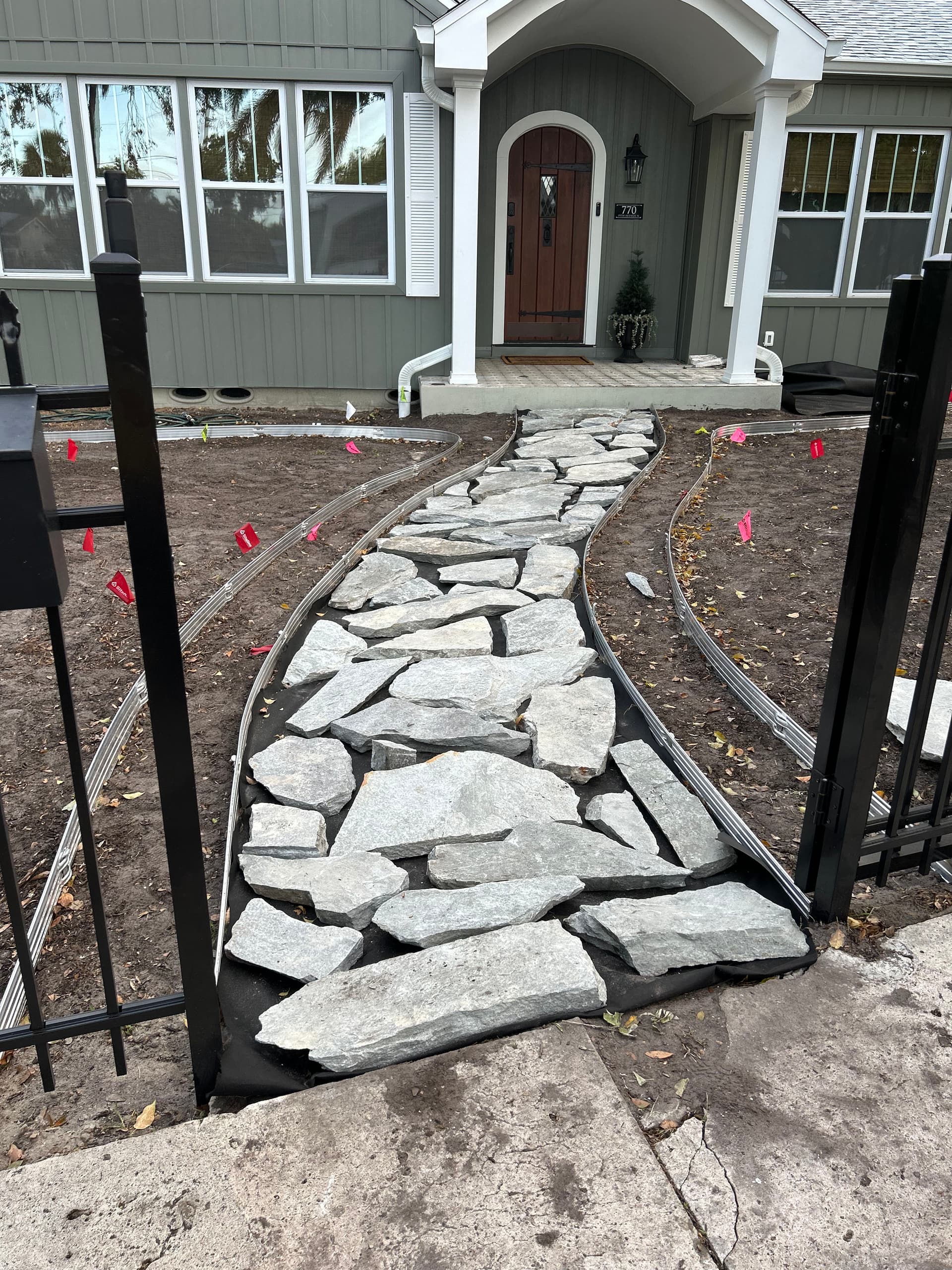 Gallery photos for Elevating Curb Appeal with a Custom Pathway and Garden Design: Image #2