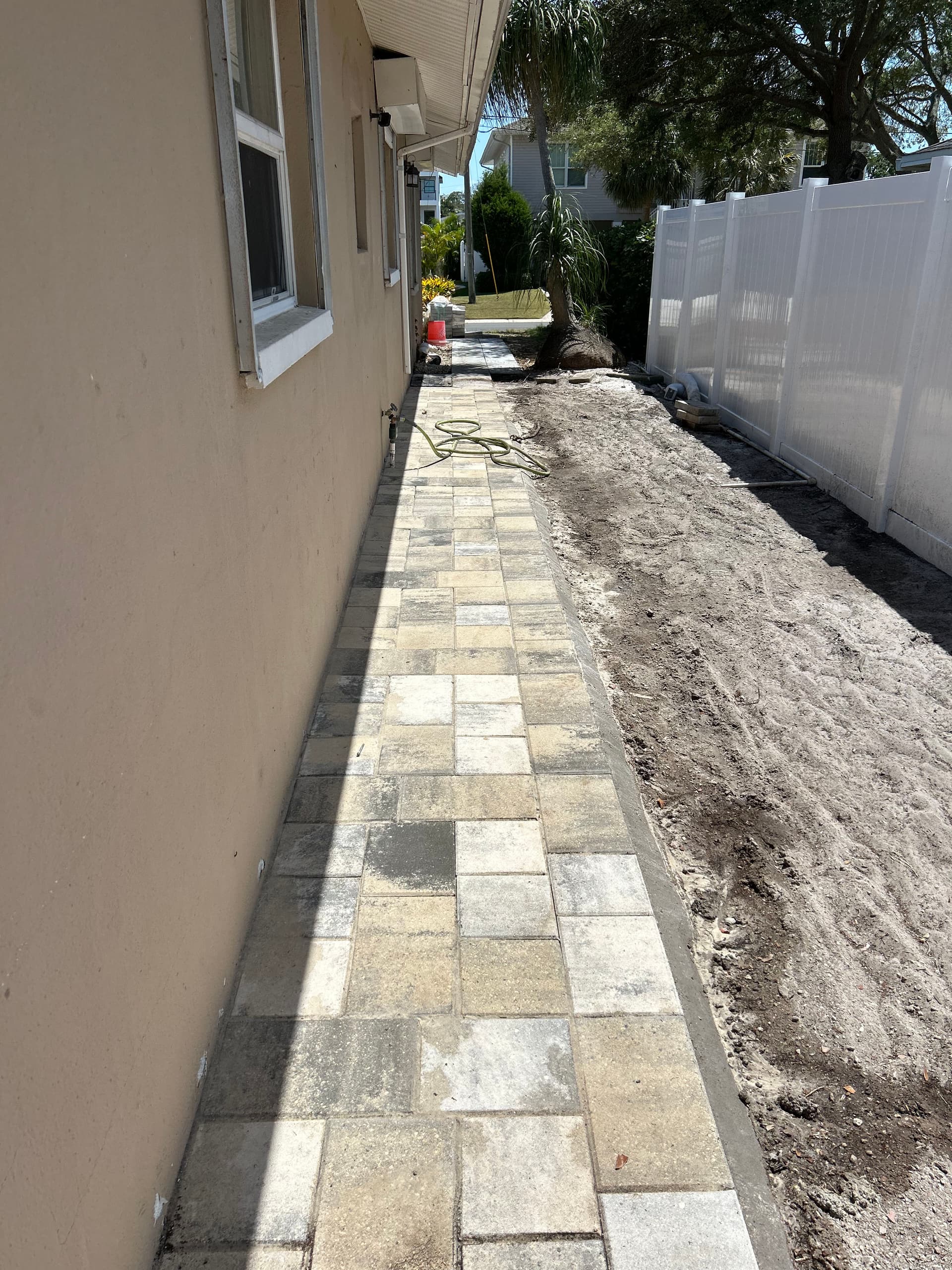 Gallery photos for Backyard Transformation with Stylish Pathways and Kid-Friendly Features: Image #3