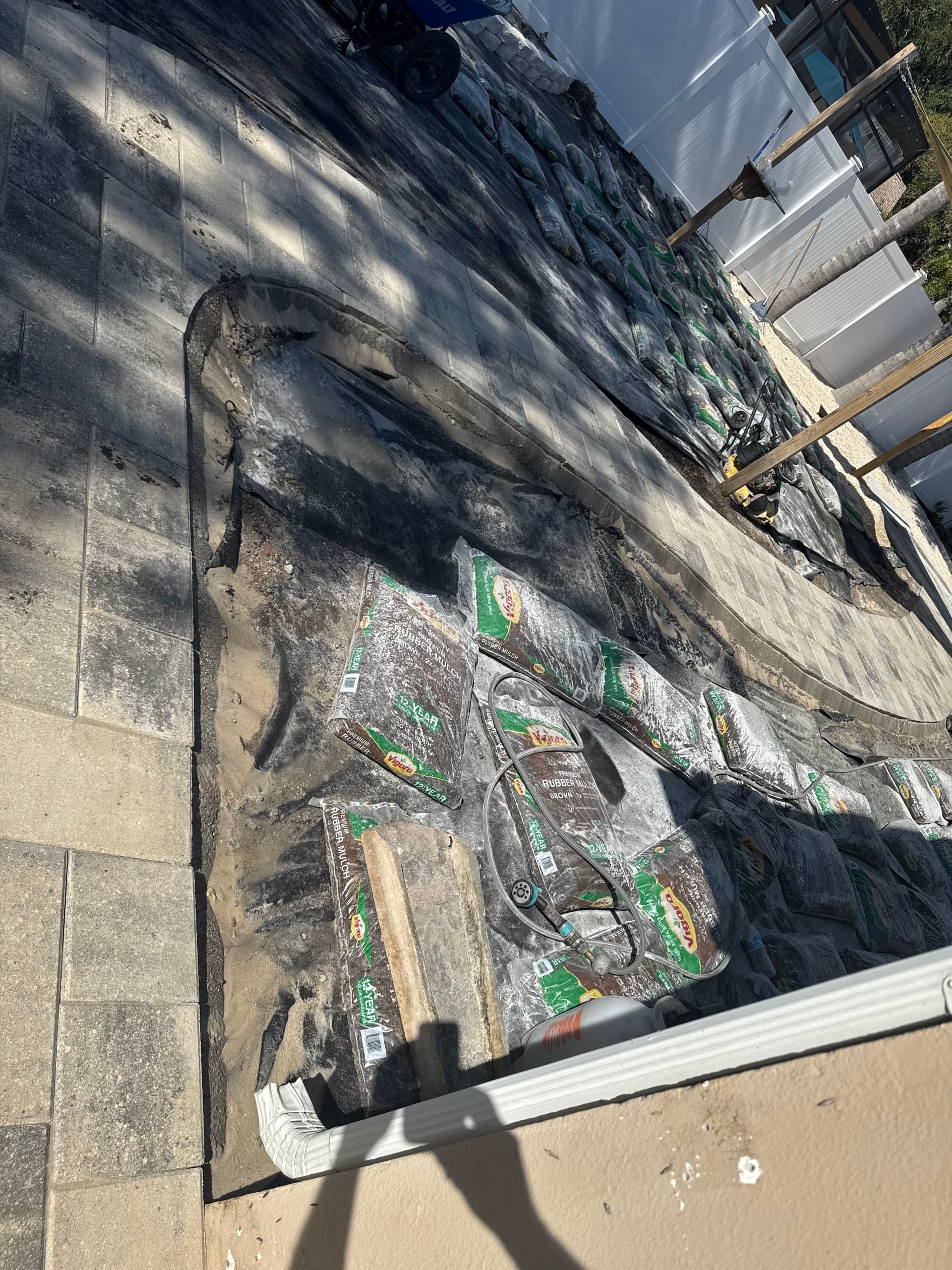 Gallery photos for Backyard Transformation with Stylish Pathways and Kid-Friendly Features: Image #4