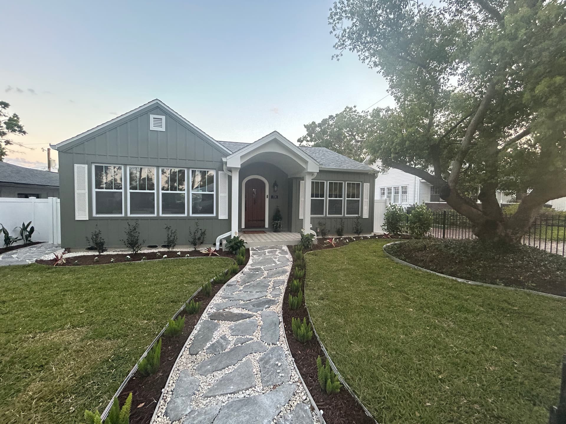 Elevating Curb Appeal with a Custom Pathway and Garden Design
