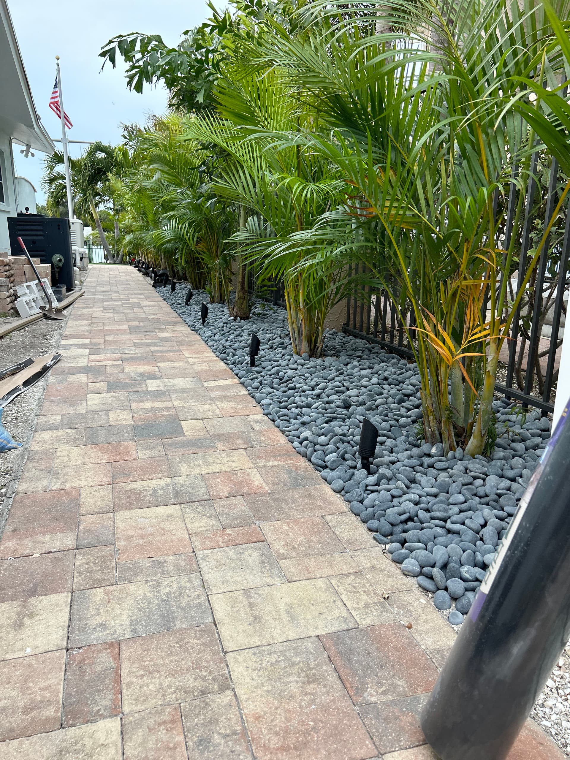 Gallery photos for Outdoor Oasis Makeover with Pavers and Palm Trees: Image #1