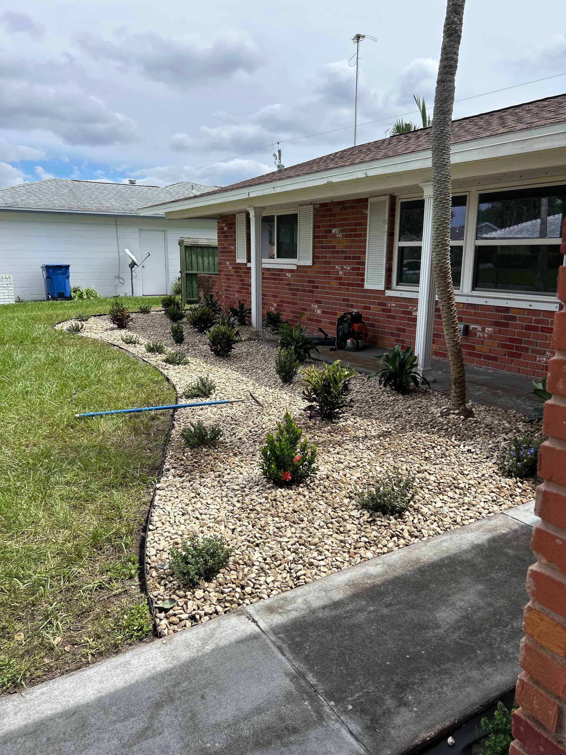 Garden Update with Decorative Rocks and Shrubs image