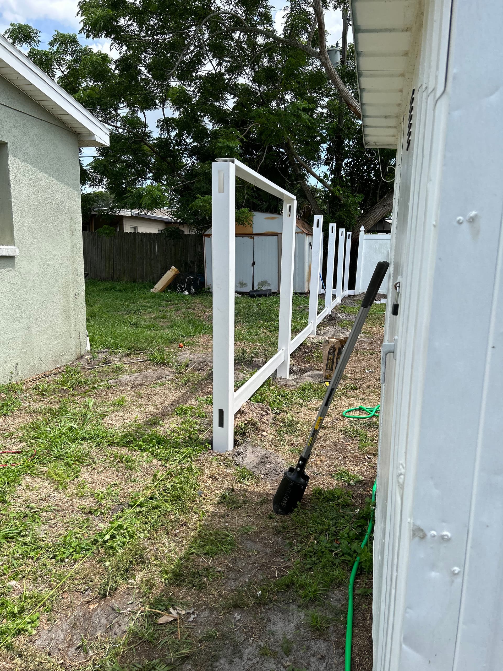 Gallery photos for Stylish White Vinyl Fence Installation: Image #4